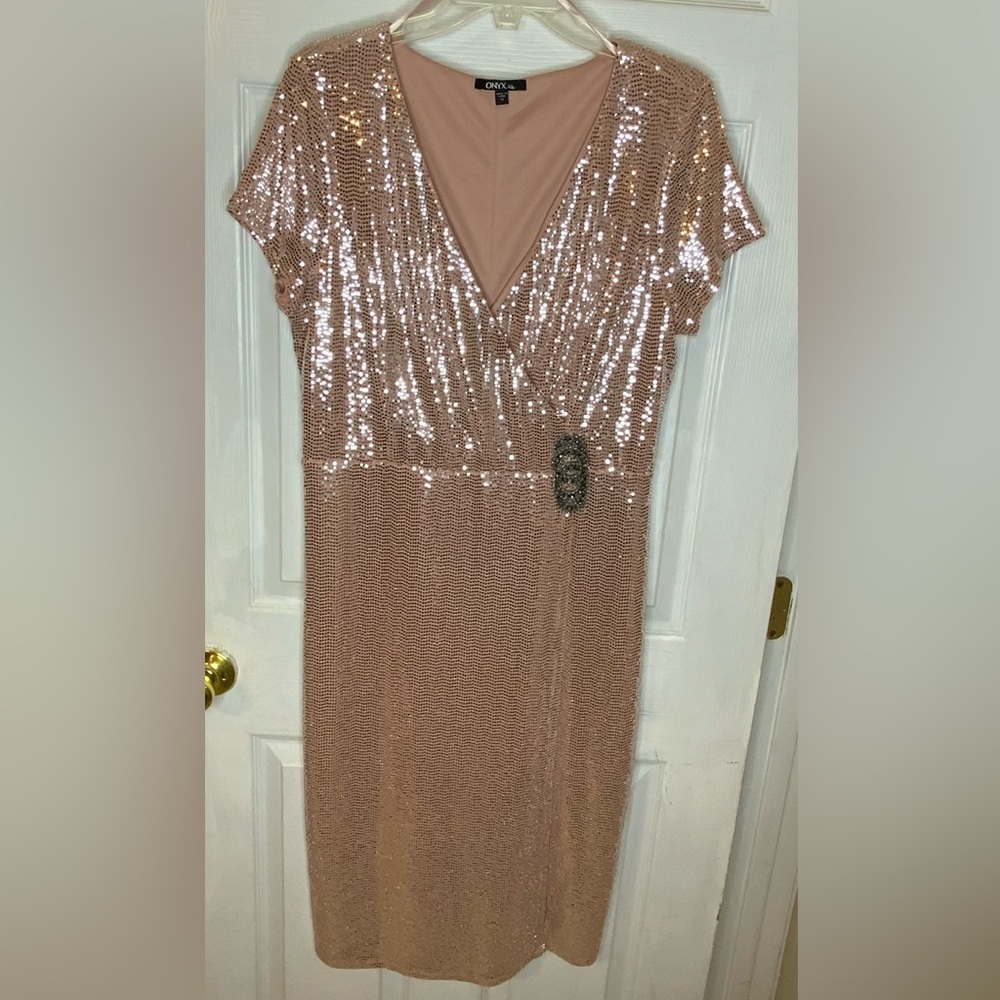 Women’s light pink/blush sparkling sequins dress.